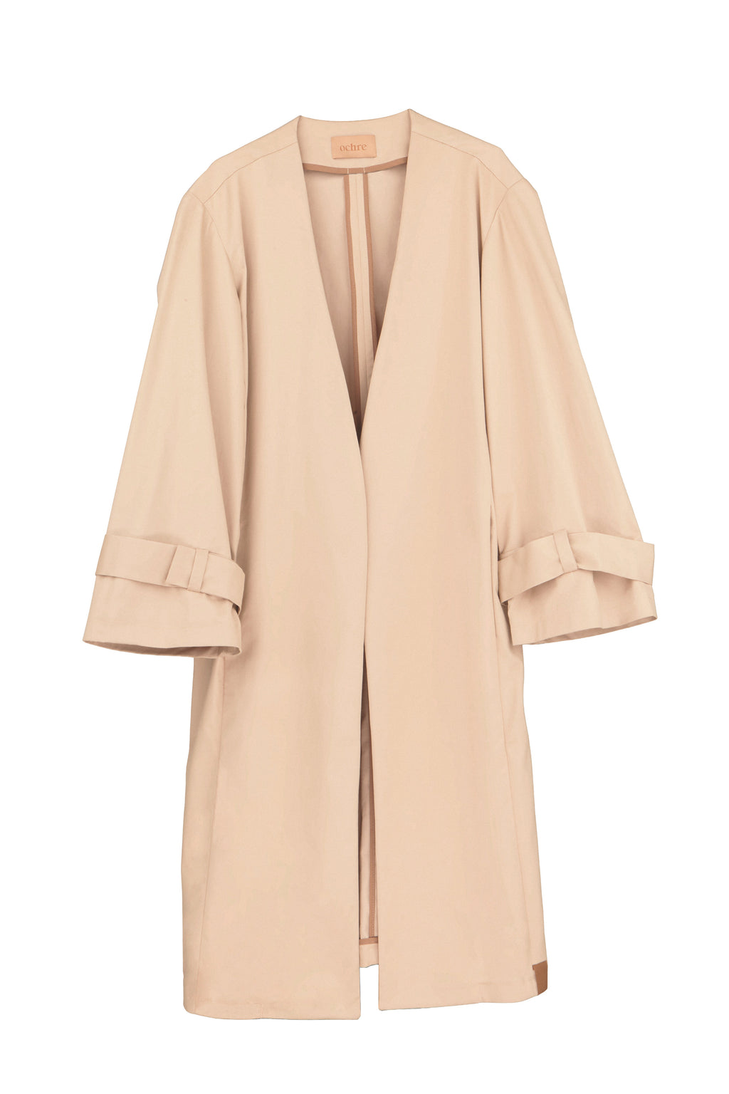 Line Coat Sand - vista frontal en campaña, abrigo arena cálida Ochre