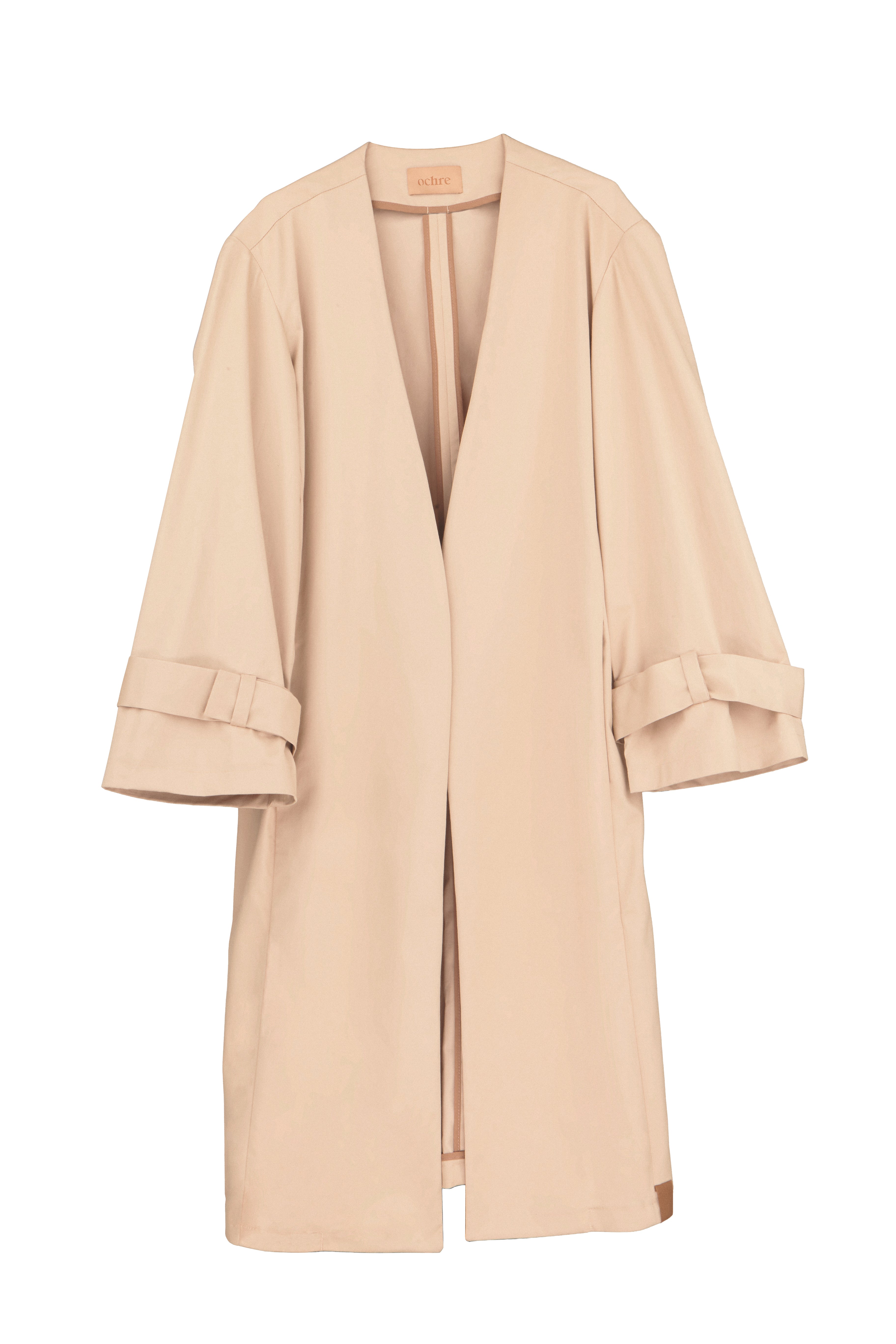 Line Coat Sand - vista frontal en campaña, abrigo arena cálida Ochre